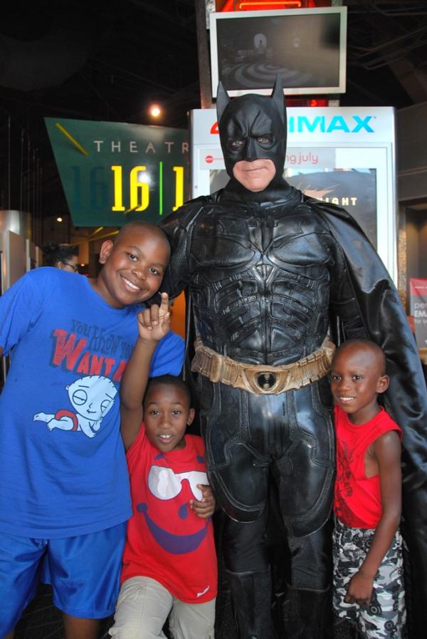AMCTheatres's tweet photo. How is everyone holding up at #AMCDarkKnight? East coast just started The Dark Knight Rises! http://t.co/8C0MWBFi