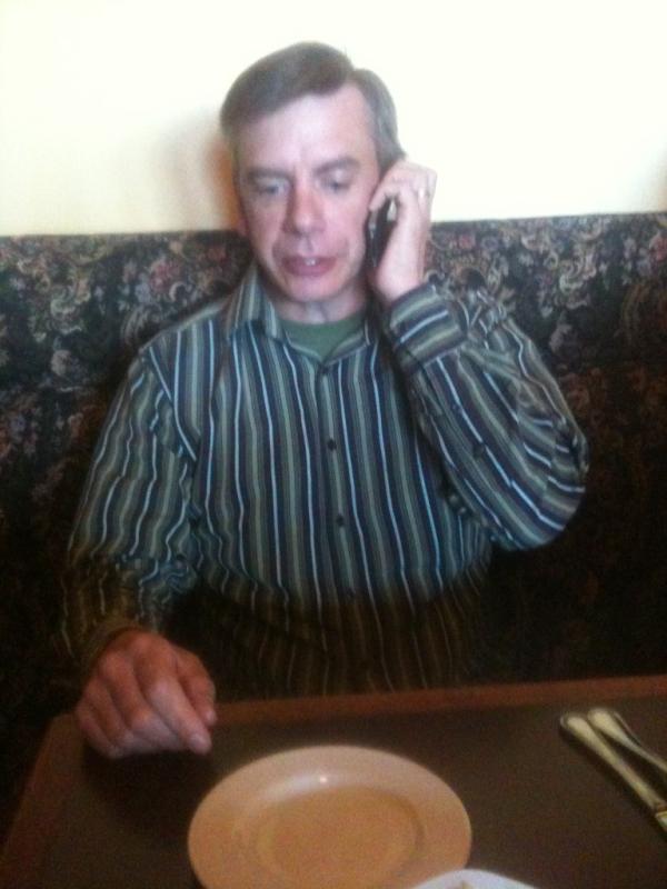 Here is <a href="/ricktlu/">NNR</a> feelin the power of the iPhone! We are having supper then heading back out to the #canolagalla plots