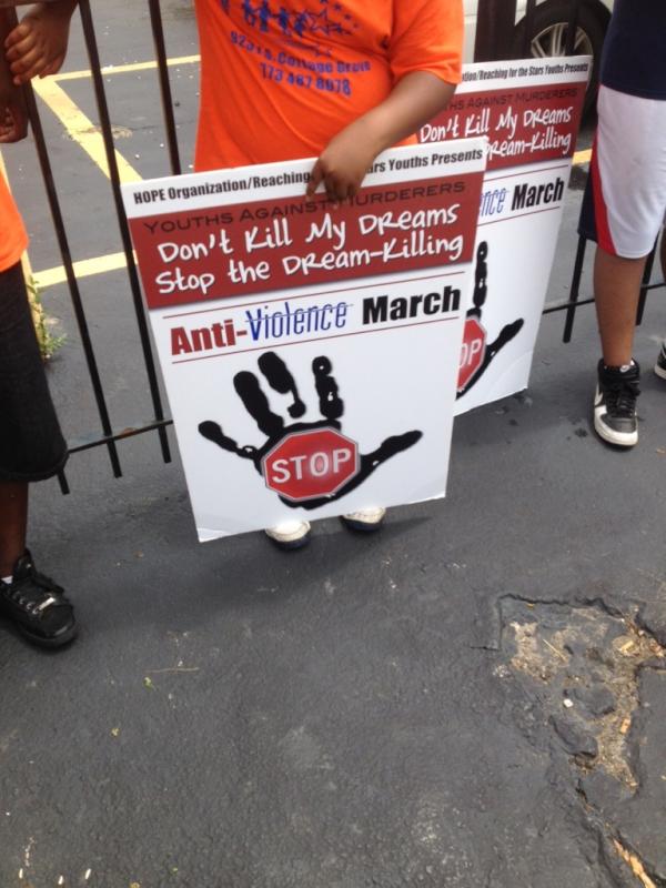 TLGraphicsChgo's tweet image. Anti-Violence March by HOPE Organization, signs by @TLGraphicsChgo