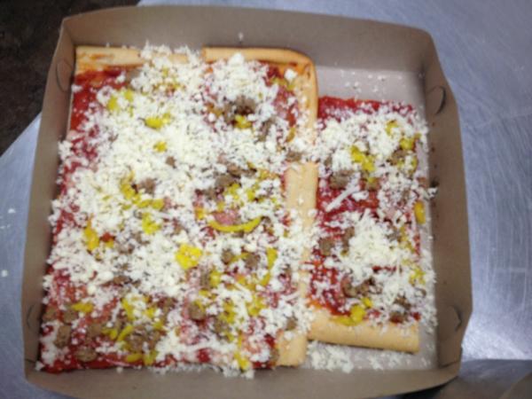 Zontinis's tweet photo. 8 slices with sausage and hot peppers! Mmmm!!! http://t.co/PYZ2yOcX