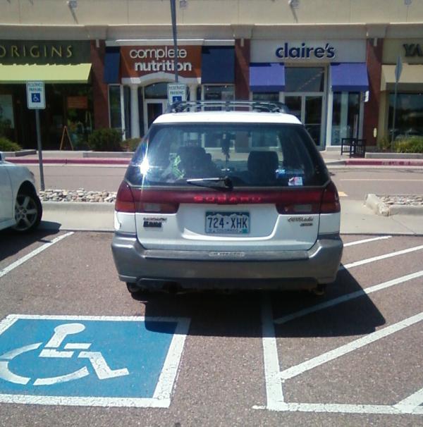 SpringsDrivers's tweet image. Beware they let blind people drive, but it's okay they have a handicapped placard. #badparkingjob