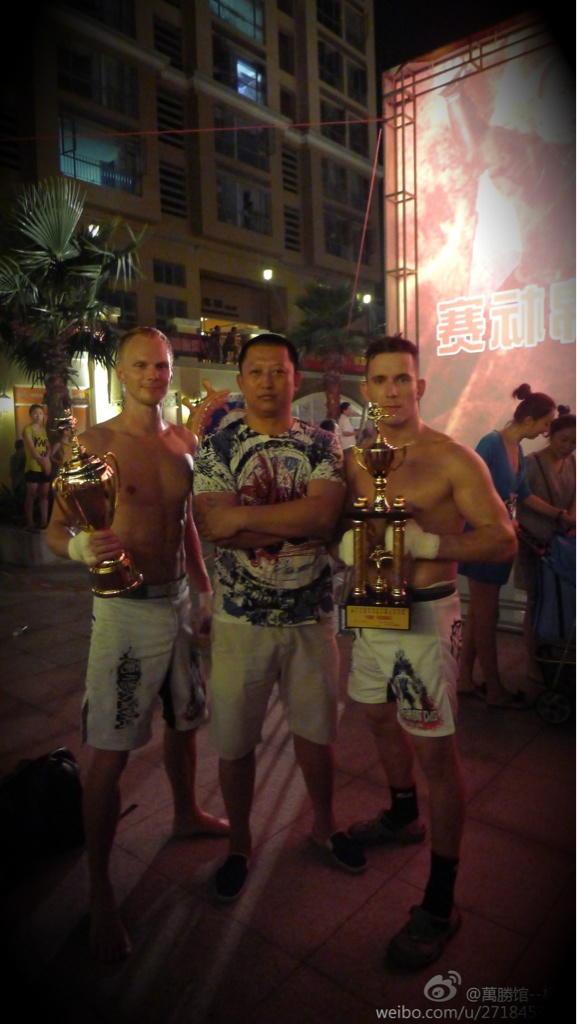 woodymma's tweet photo. Anton and I are the SZ Champs! 3yrs in a row for me. 1round TKO kick to the body. In the middle is coach Sam. http://t.co/SOx3jgpw