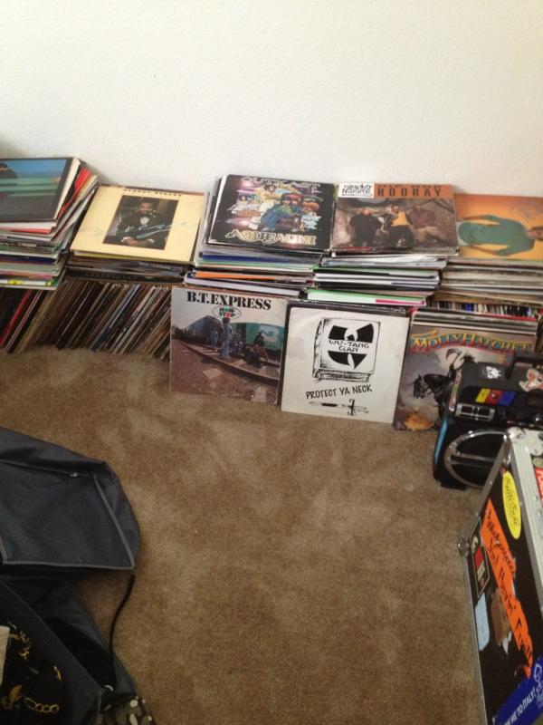 djsonar's tweet photo. Starting to unpack the vinyl at the new digs. http://t.co/6FOxZ9je