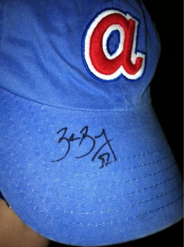 jeri_2011's tweet photo. After two hrs in the rain we were not leaving til I got my @Brandon_Beachy autograph! Thanks Brandon!!! #lovemybraves http://t.co/FrwfRRPB