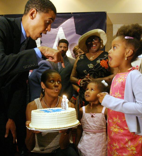 MichelleObama's tweet photo. Happy birthday, @BarackObama! Here’s an old favorite photo from three of your biggest fans. We’re so proud of you!–mo http://t.co/7alDwpDQ