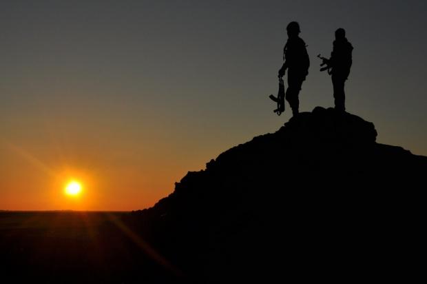 KurdishPress's tweet photo. (#YPG) fighters stand on top of a hill at sunset after they retook parts of the town of #Tal_Hamis (#AFP)
#Peshmerga http://t.co/0bKDPUfZiU