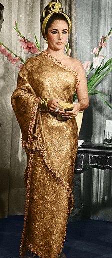 Happy Birthday Elizabeth Taylor

Photo: 1964 in Cristobal Gold Sari   