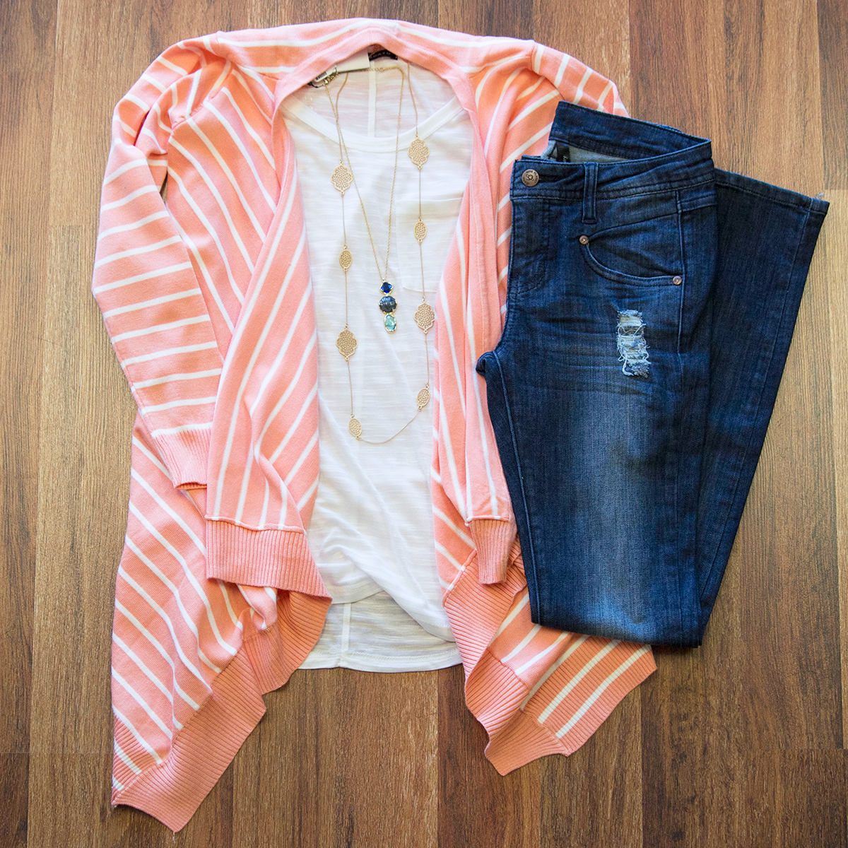 shopamaranth's tweet photo. This peach striped cardi is perfect to add some color now and also carry into spring! #shopamaranth http://t.co/j7ZAoQl102