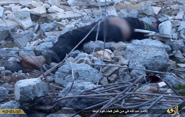 Smash_Jihad's tweet photo. Syria: Another gay man bound +blindfolded by IS, then thrown off  bldg to die on rubble below:http://t.co/4mvLSXVihc http://t.co/YpQKGcobV8