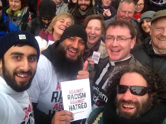 Father_Tony's tweet photo. Black and white together as #NewcastleUnites #againstPegida http://t.co/mKxxHF2XVA