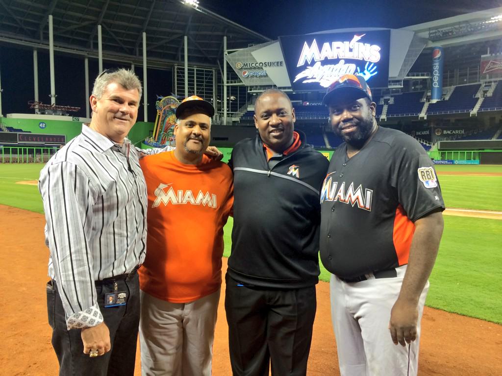MarlinsImpact's tweet photo. President of Baseball Ops Michael Hill &amp; GM Dan Jennings w/ the coaches of our RBI World Series teams! #AyudanWeek http://t.co/VcOLRafBf1