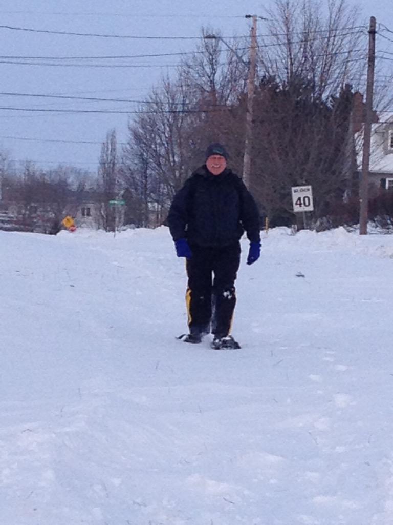 RCMPPEITraffic's tweet photo. RCMP members across the island are dedicated to serve you, making the trek to work on snow shoes today. Cst. Parsons. http://t.co/tw7SWsX0da