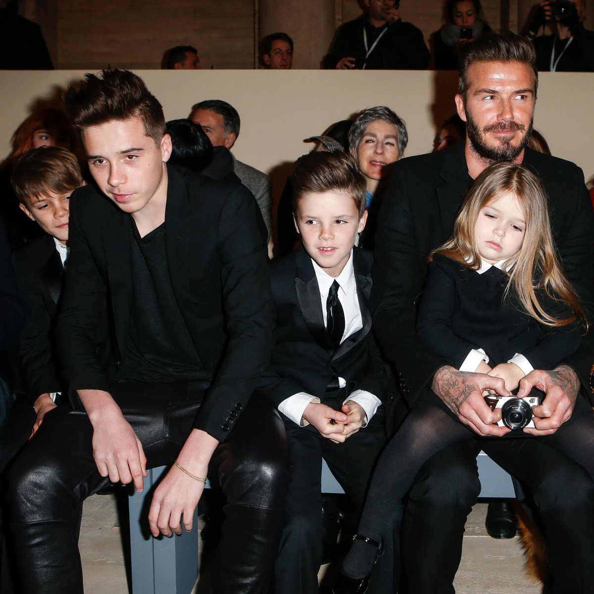 David Beckham sits front row at wife Victoria Beckham's show. (Twitter/ @ELINNF_)