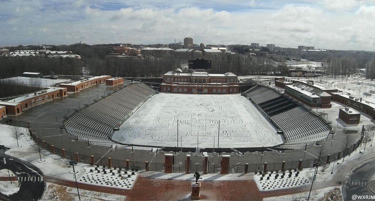 UNCCWeather's tweet photo. RT @wxrjm: A sleet/ice covered Jerry Richardson Stadium at UNC Charlotte http://t.co/dlVSoYCtLj