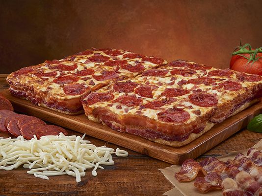 Little Caesars tries bacon-wrapped crust pizza. Would you try it? on.wzzm.com/1AlfCzU