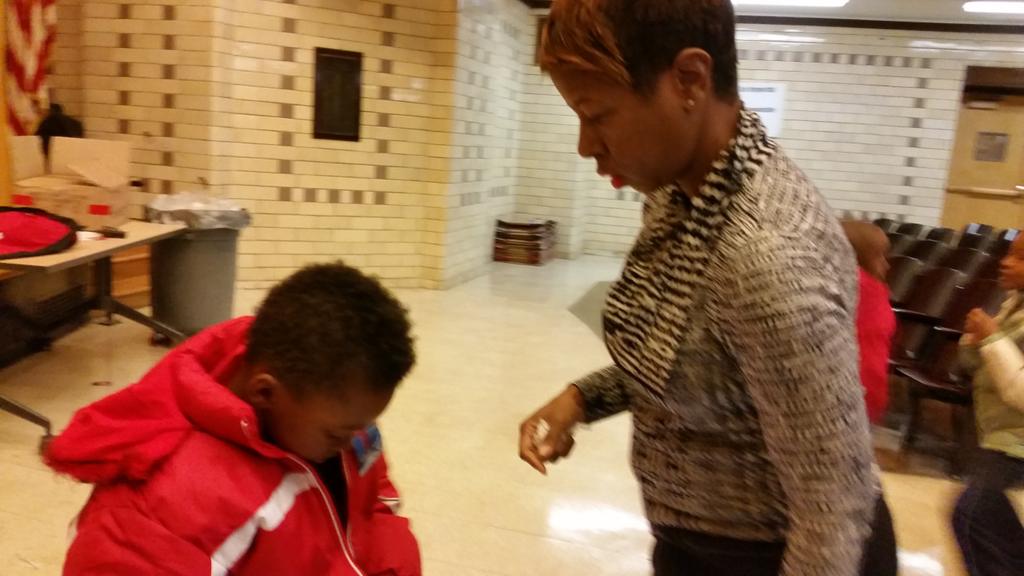 Mrs. Ginwright helps students to stay warm by distributing coats to our students. <a href="/TiltonSTEM/">Tilton Elementary</a>
