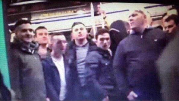 FunnyThingsUK's tweet photo. RT the faces of these racist football fans, who refused to let a black man on the train. #chelsearacists http://t.co/4FgYXdHSvn