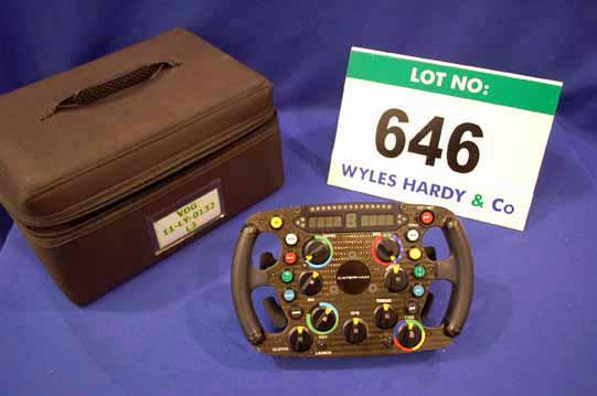 CaterhamF1's tweet photo. #CaterhamF1 Auction Race& PitLane Equip LOT646 2011 full function steering wheel http://t.co/LrUCNW5dv1 #F1 #jpf1 http://t.co/dpMYKGis5j
