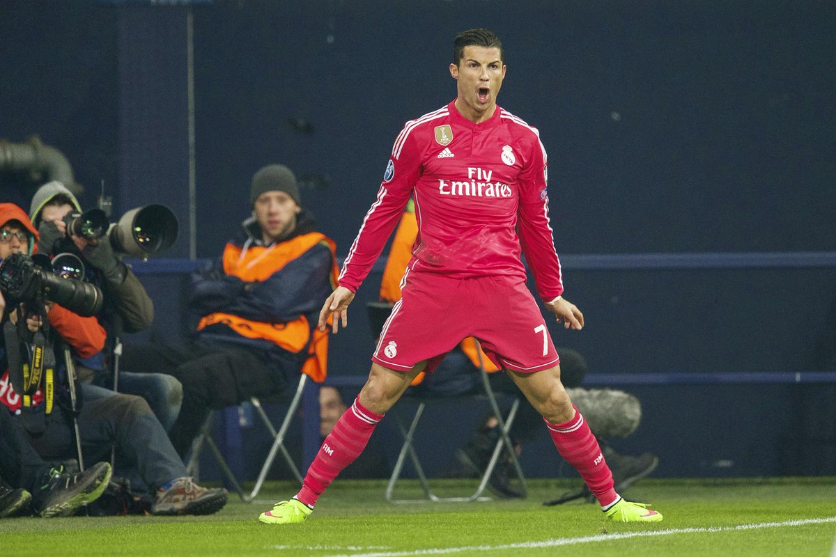 SportsCenter's tweet photo. ¡Hala Madrid! Cristiano Ronaldo's header leads the way as Real Madrid beats Schalke, 2-0, in Champions League. http://t.co/gSaE0zUNPu