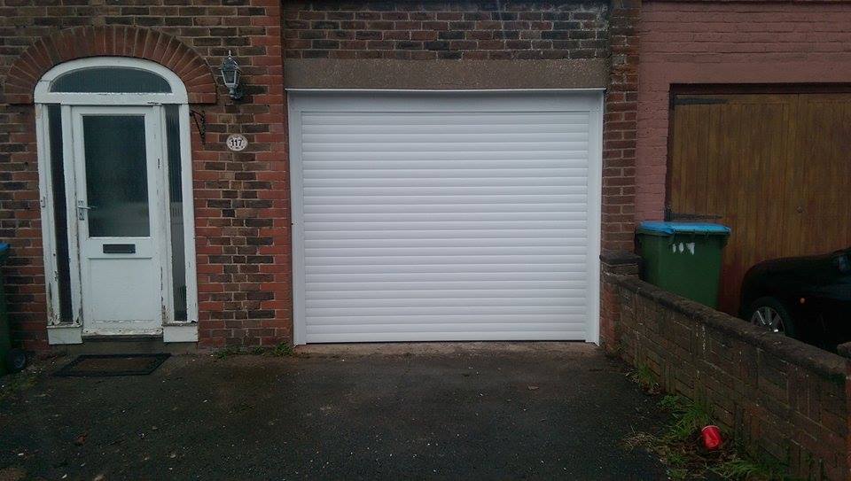 New garage door that we fitted this morning! before and after!!