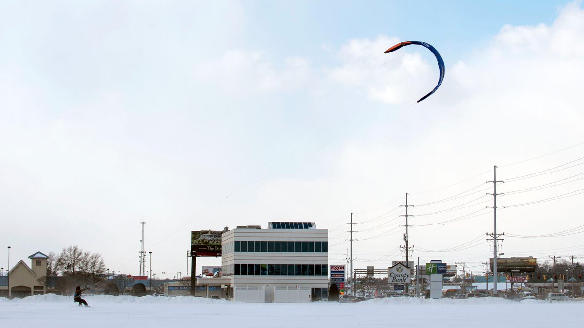 joe_lamb2's tweet photo. You don't see this everyday at the #beach: Sean Colgan of #RehobothBeach #kiteboards in the snow along Coastal Hwy. http://t.co/WuQmv0n71T