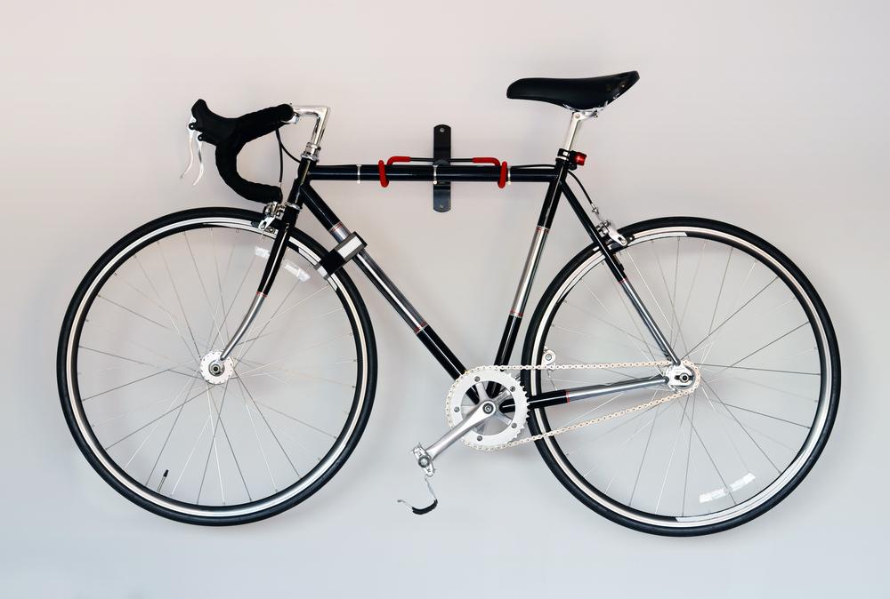 Hanging your bike on a wall will make your space feel larger.