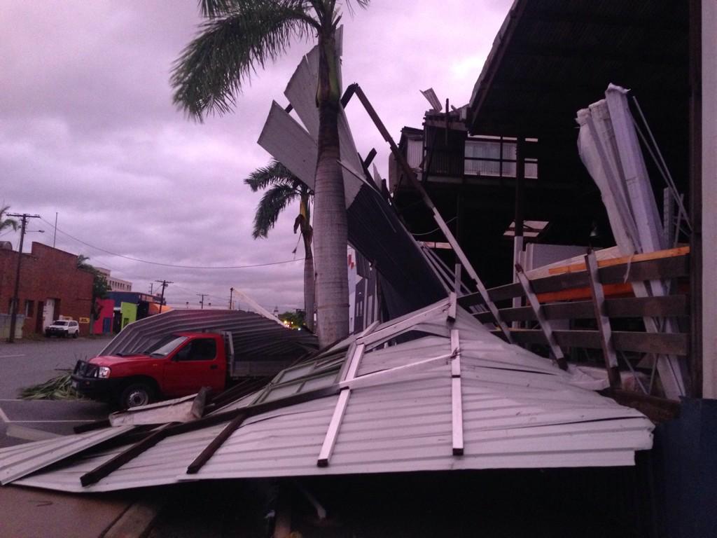 News24Aust's tweet photo. There's an eerie red glow across Rockhampton as the sun sets, locals out seeing the damage done  http://t.co/Tc70IPIyRQ (@campricenews)