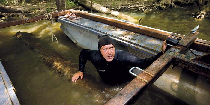 gardenandgun's tweet photo. The swamp men of Florida who risk their lives diving for 150-year-old cypress logs. http://t.co/euaziS9de3 http://t.co/cjpGVhOWz2