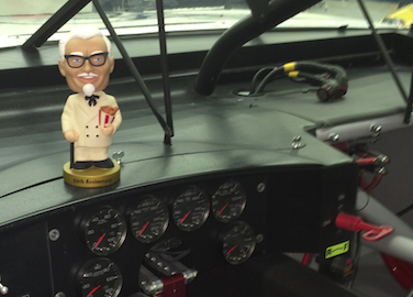 kfc's tweet image. Looks like @DavidRagan took his Colonel Sanders bobble head along for the ride. #Daytona500