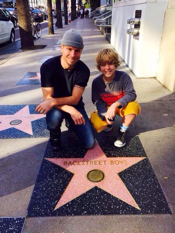   Happy birthday to Walk of Famer Brian Littrell! // Thank you Ana!  Bri & son @ WOF  