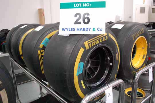 CaterhamF1's tweet photo. @baszeroRACING THKS for RT #CaterhamF1 Auction Race Equip LOT26 #Pirelli slicks&rims http://t.co/pcT9BBtYY5 #F1 #jpf1 http://t.co/gfhoAFebk1