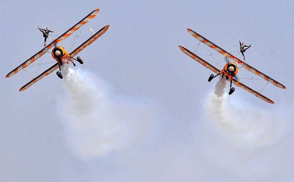 DeccanHerald's tweet photo. #AeroIndia2015 : Angels on wings #TheBreitlingWingwalkers
Watch Video - http://t.co/QDnCSPYbW7 #DHPhoto http://t.co/lpV4ijDUS9