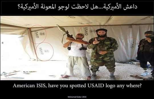 Eskandarany2011's tweet photo. Not a secret anymore: z #US is sponsoring #ISIS. #USAID logo in z background. #قطر_بنت_الوسخة http://t.co/tmRk5C3vpo #Jobs4ISIS #Qatar #IS
