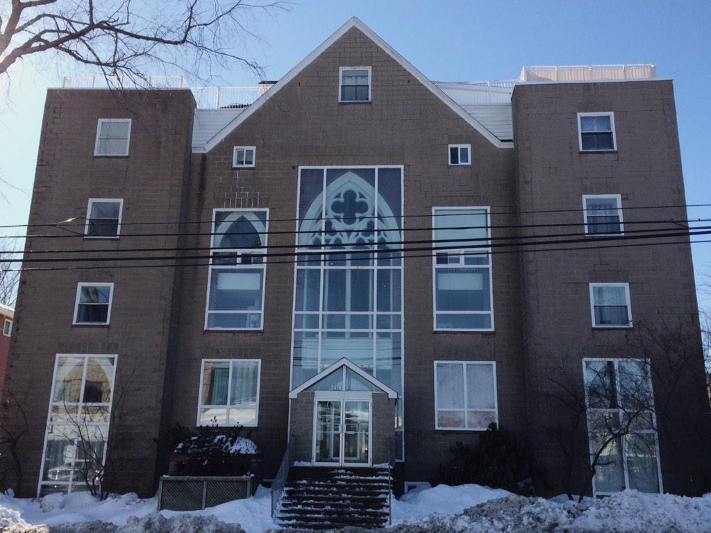 Didja know? This Robie St. apartment used to be a church — you can see it right through the windows!