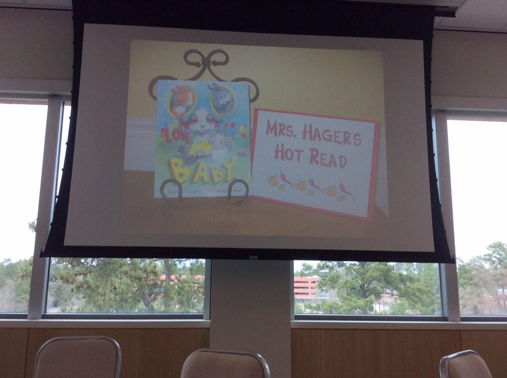 motivated2read's tweet photo. #TALE2015 Put what you're currently reading on the stand. How long will it be before a kid asks you about it? http://t.co/WjnOSQFcvT