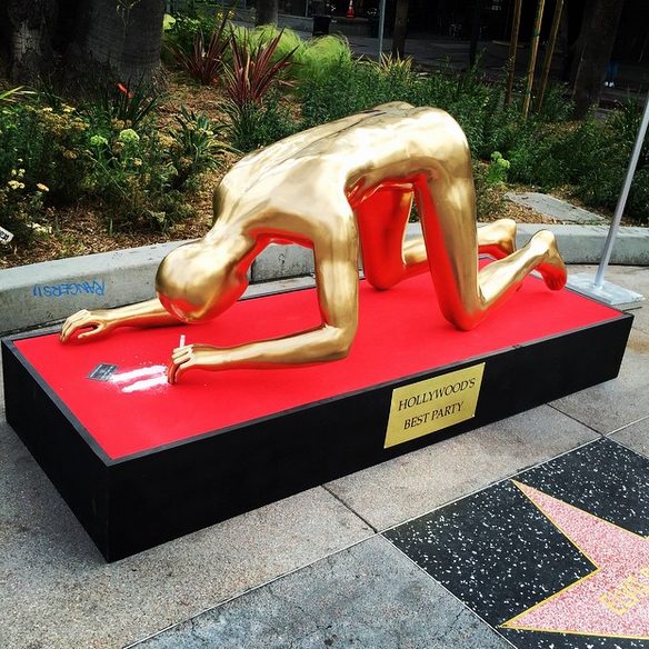 PageSix's tweet photo. ICYMI: A street artist installed a cocaine-snorting Oscar statue on Hollywood Boulevard http://t.co/mvWpElVk3b http://t.co/IEAPFyEiXR