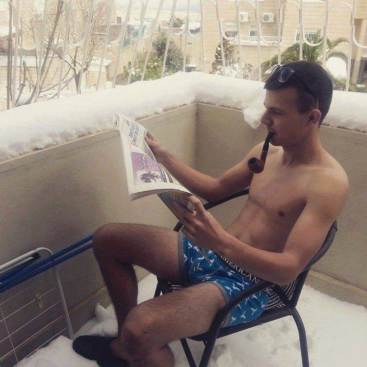 WorldForumRJ's tweet photo. This is how Russian - speaking Israelis reacted to the snow storm in Israel last week.
"What storm?" #Israel #snow http://t.co/wlCkfU3kvj