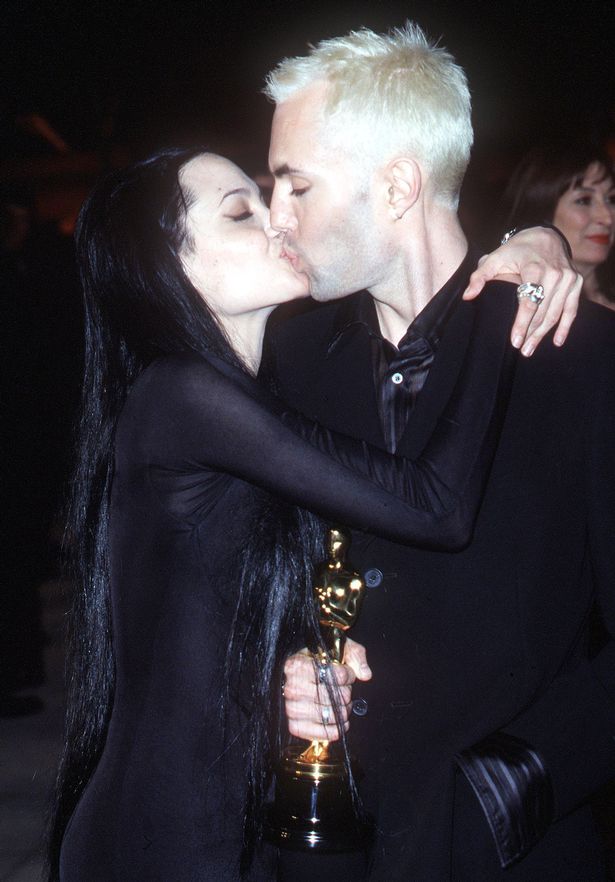 IncestNews's tweet photo. An Oscar moment, Angelina Jolie kissing her brother #Oscars #incestisbest http://t.co/2M5jkBcJcD