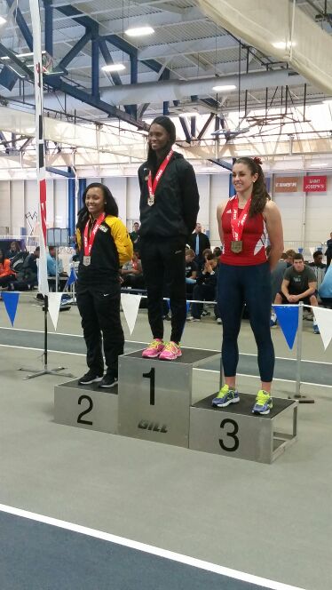 GeorgeMasonTFXC's tweet photo. Shavon Briscoe receiving her 1st place medal 60mh.....#A10Record #GoMason #MasonNation #A10Champs http://t.co/b4IJsLuxBB