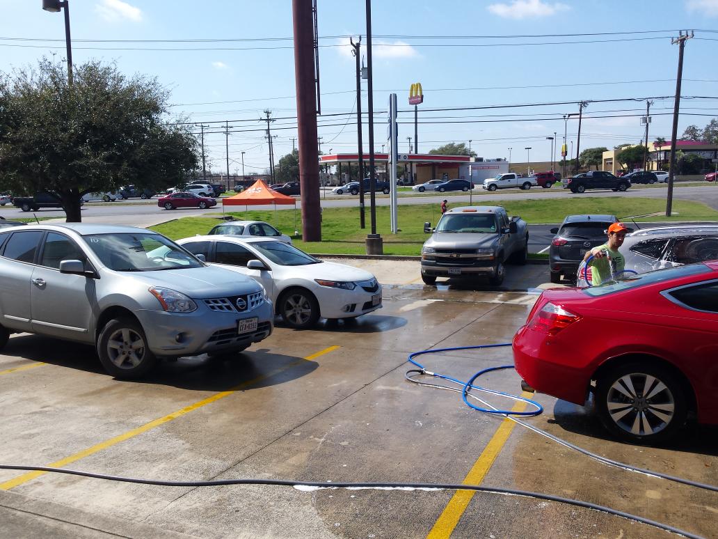 TeamWingmanMS's tweet photo. We had a #carwash and #fundraised $1,000 to #impactMS. #Churchill HS raised $425 to put @WingmanRudy in a #tutu http://t.co/7wewE23T7x