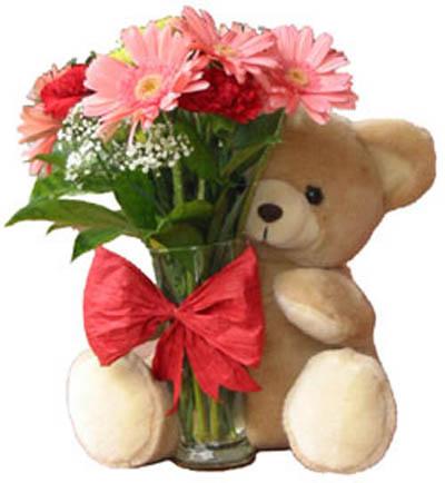 Медвежонок дарит цветочек. Медвежонок с букетом. Медвежонок с цветами. Анимированные стикеры. Мишка с букетом цветов.