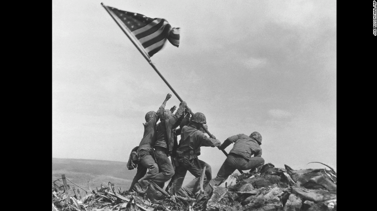 CNN's tweet photo. Today marks 70 years since this iconic photo was taken. This is the inside story behind it: http://t.co/pPLpGJCdEm http://t.co/onYCoIASER