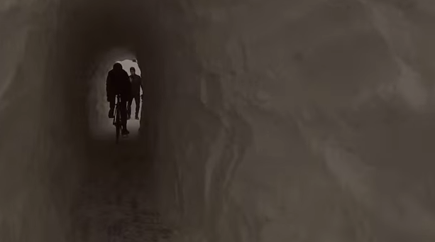 Photo: This 40-foot snow tunnel made an important biking and walking path useful again. Image: Dragonbeard on Youtube. 