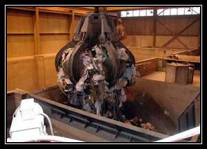 MagnetekInc's tweet photo. How do you turn 400 tons of trash into energy? See how #cranes with VFDs increase production. http://t.co/Nf0hYxQW0s http://t.co/z72ipGZnwb