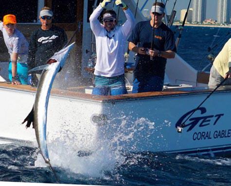 indianfishing's tweet photo. Maj. Peter Jennison, of Florida Army National Guard, and his son, Morgan, bring in a sailfish http://t.co/il8I5Y3YZA