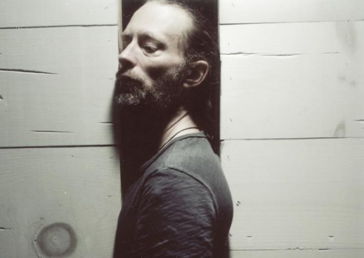 pitchfork's tweet photo. Thom Yorke and Massive Attack's Robert Del Naja Release UK Gold soundtrack for free http://t.co/xQu7IGl4YP http://t.co/Qdq1m9rWJO