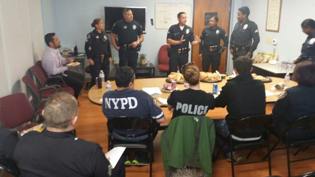 LAPDCPU's tweet photo. Sgt Tingirides &amp; SOE HACLA sharing stories with #NYPD and #Muskogee PD. community safety partnership work #LAPDHQ http://t.co/H5Kk5nTTWP