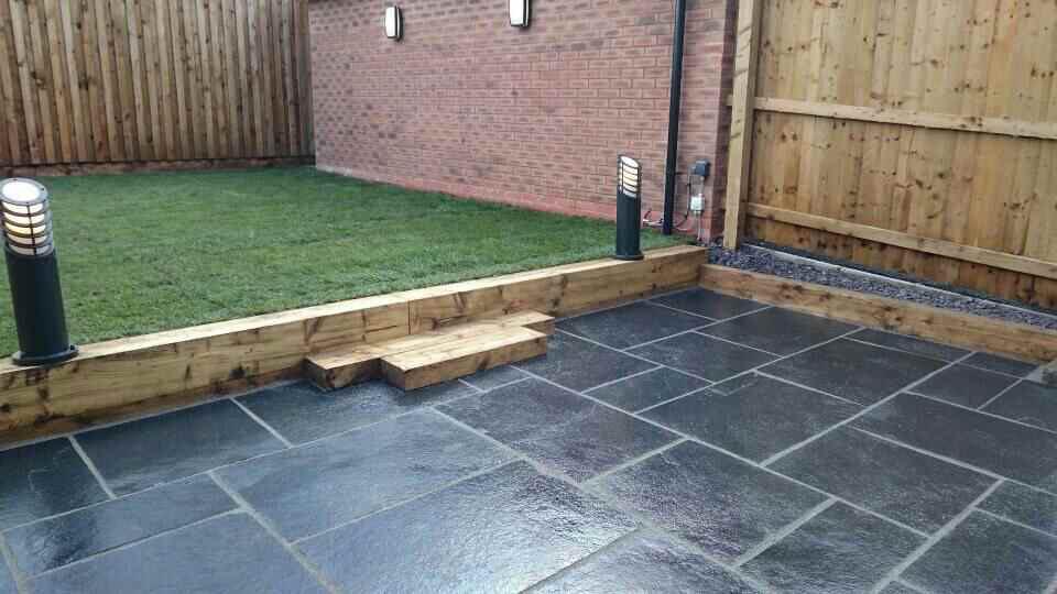 Nice job to start the week off!! Wall lights/barrier lights, sleepers, turf and a black limestone patio (2&amp;1/2 days)