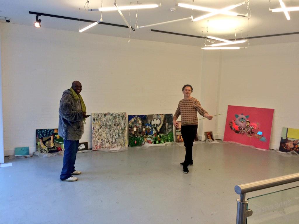 displaygallery's tweet photo. Curators @Cedric_Christie and #PascalRousson setting up for our new show Sunday in the Park with Ed, PV 5th of March http://t.co/5kDKKnJA6U