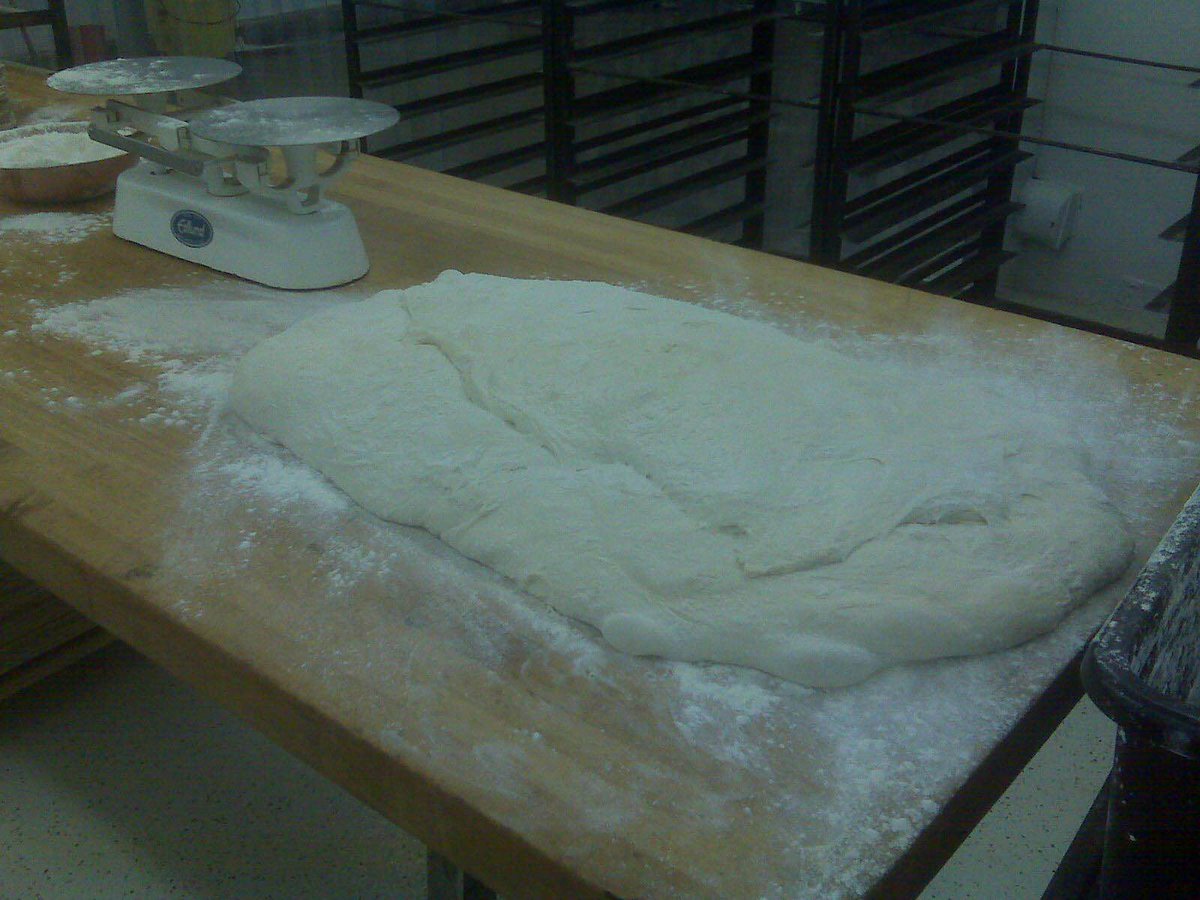 slowdough's tweet photo. Marlo showing off our first ciabatta!  April 2009 #tbt @sdbakeshophtx http://t.co/ntgsnTNxbo